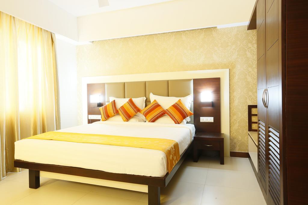 Hotel Moonlit Regency Thodupuzha Стая снимка
